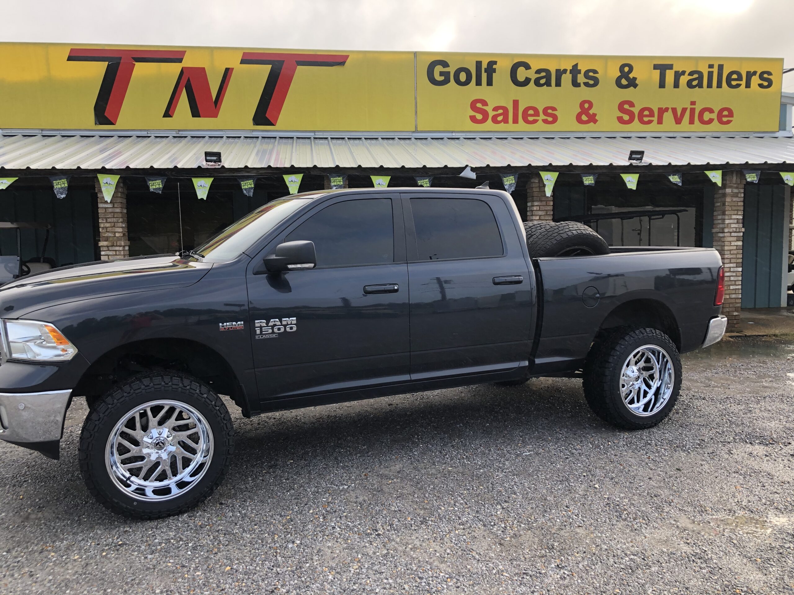 Ram 1500 with 6” Rough Country Lift 22” Fuel Triton Wheels 35”-12.50-22 Tires